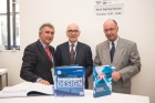 LID Publishing CEO, Marcelino Elosua (l) with Dr. Richard Straub and Lukas Michel (r)